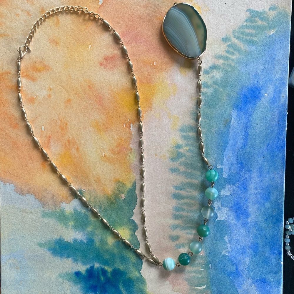 Pendant necklace in gold and blue, with gorgeous blue stone pendant